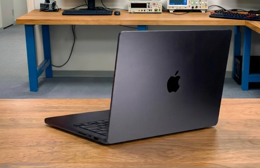 Apple MacBook Pro M5 Review: Full Spes, Real Performance, Battery & Testing 2 Rear angled view of Apple MacBook Pro M5 showing the Apple logo on the lid
