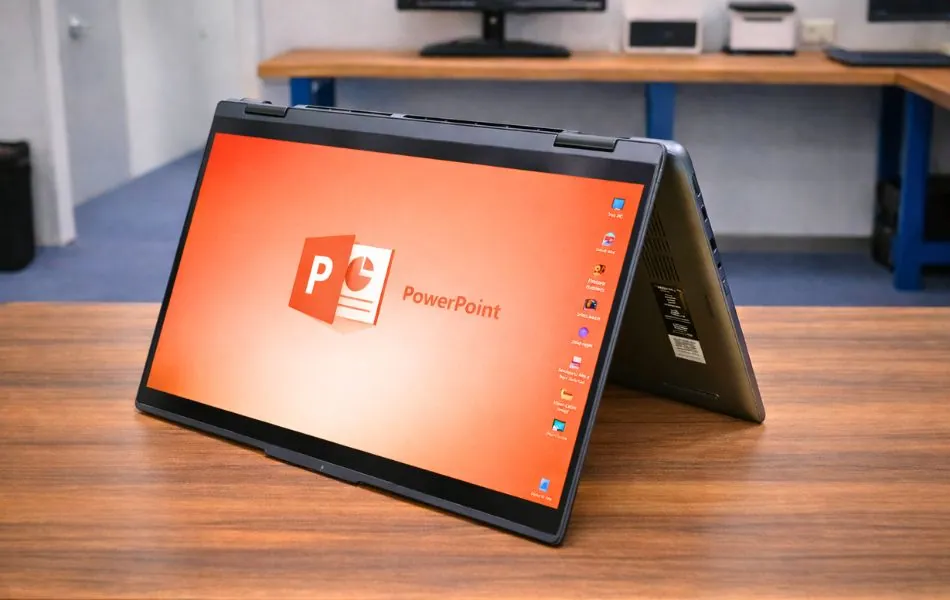Best Laptops for Trading in 2026: Multi-Monitor, and All-Day Ready 33 Lenovo Yoga 7i 2-in-1 laptop used in tablet mode on pcvenus testing table with Microsoft PowerPoint open.