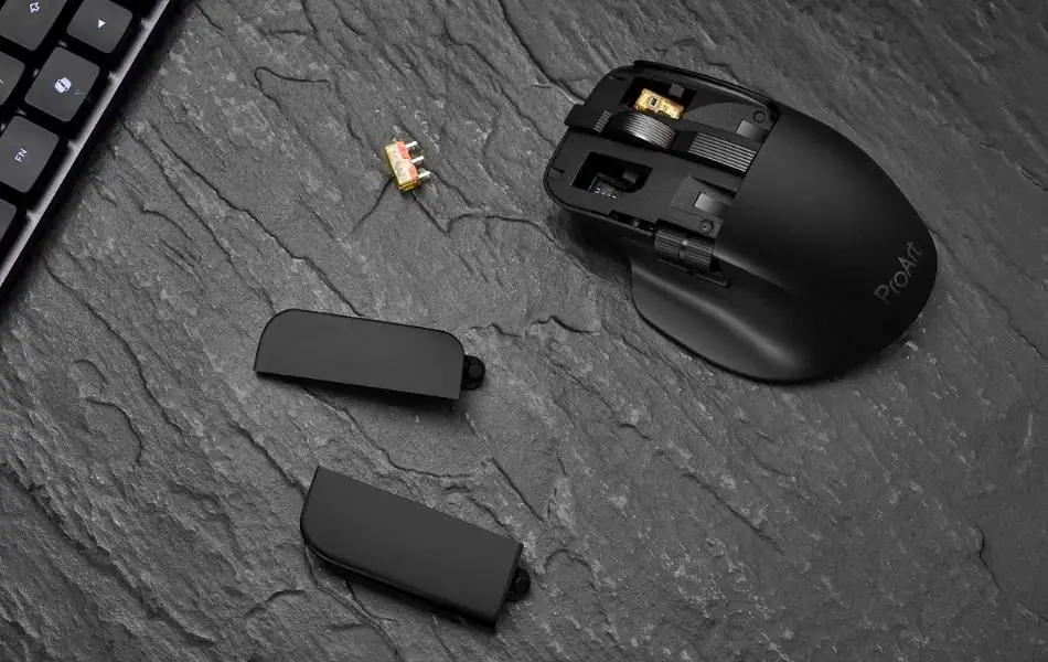 ASUS ProArt Mouse MD301 Launches With Swappable Switches, 180 Days Battery Life 1 ASUS ProArt Mouse MD301 with exposed swappable switches and internal mechanism