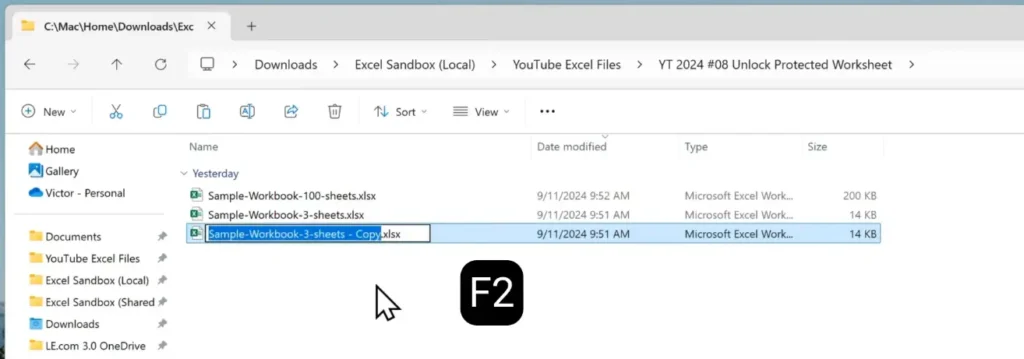 Renaming a copied Excel worksheet file using the F2 key in Windows.