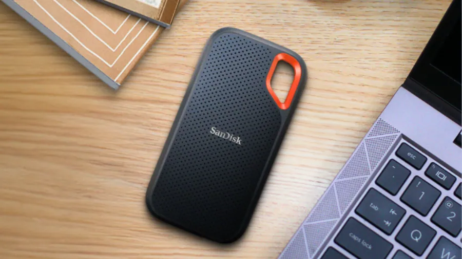 SanDisk Extreme PRO Portable SSD Reaches 4,000 MB/s, 8TB 1 SanDisk Extreme PRO Portable SSD next to laptop