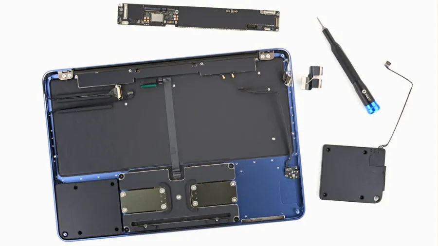 MacBook Neo disassembled parts during repairability teardown