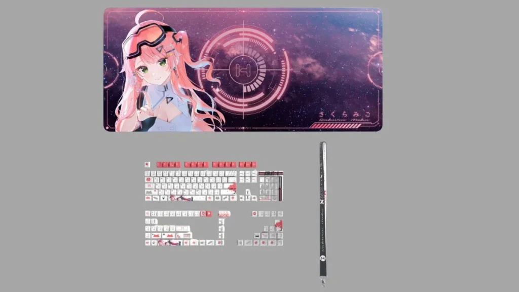 HYTE Launches Sakura Miko hololive Y70 Case With Matching Accessories 2 HYTE Sakura Miko hololive Y70 bundle showing desk mat, keyboard keycaps, and themed accessories