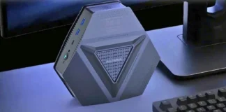 ALLIWAVA GH9 Mini PC Packs Core i9 Power Into a Compact Desktop ALLIWAVA GH9 Mini PC placed on a desk beside a keyboard and monitor, showing its compact geometric design