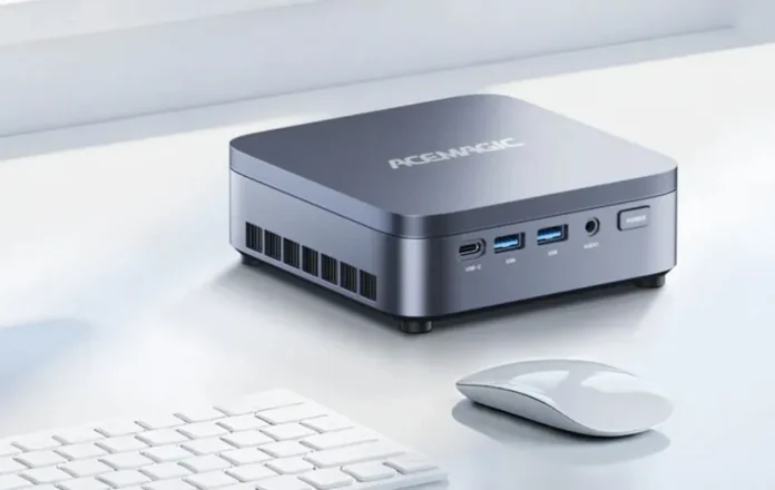 Acemagic M5 mini PC with compact metal chassis and front USB ports on a desk