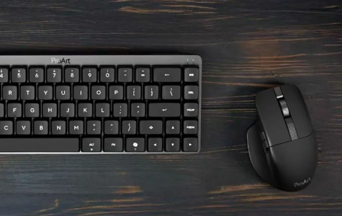 ASUS ProArt Mouse MD301 shown alongside ProArt keyboard on a professional desk setup