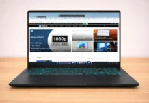 ASUS V16 2026: Review (Gaming FPS, Benchmarks & Thermals) ASUS V16 gaming laptop front view with display and backlit keyboard