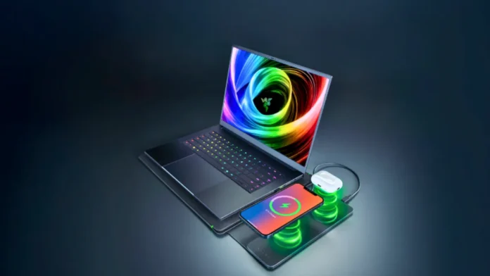 Razer 16-inch laptop sleeve with dual 15W MagSafe wireless charging powering phone and earbuds