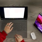 Lenovo IdeaPad 5a 2-in-1 Gen 11 used with smartphone and tablet for multitasking setup