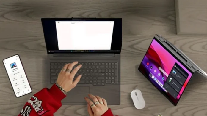 Lenovo IdeaPad 5a 2-in-1 Gen 11 used with smartphone and tablet for multitasking setup