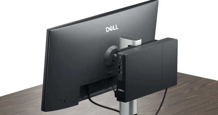 Dell Pro Micro Thin Client Q9M1260 mounted behind Dell monitor showing compact fanless design and cable-managed workspace setup