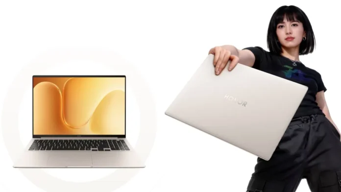 Honor MagicBook 16 (2026) Lifestyle Honor MagicBook 16 2026 lifestyle image with user holding laptop showcasing lightweight design and portable build