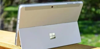 Microsoft Raises Surface PC Prices by Up to $500 After Hardware Cost Increase Microsoft Surface PC tablet-laptop hybrid shown from rear with built-in kickstand open outdoors