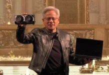 Nvidia Denies PC Maker Acquisition Talks After Market Surge Nvidia CEO Jensen Huang holding a GPU during keynote amid PC acquisition rumor news