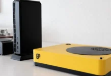 Playnix Console Linux Gaming PC Launches at €1,139 With RX 9060 XT 16GB Playnix Console Linux Gaming PC shown on desk beside compact desktop systems in a modern workspace