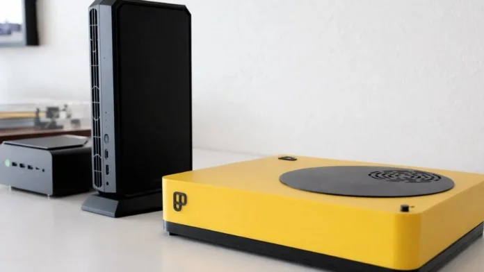 Playnix Console Linux Gaming PC shown on desk beside compact desktop systems in a modern workspace
