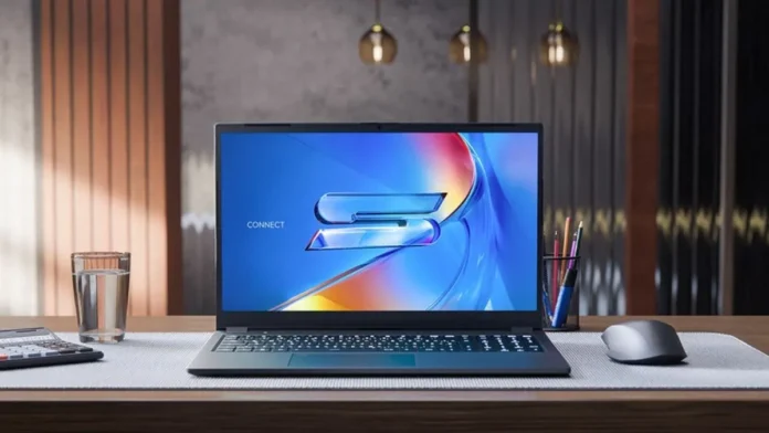 Schenker Connect 15 office laptop placed on desk in office workspace setup with mouse and accessories