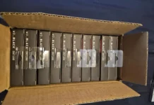 Reddit User Orders 1 WD Black SSD, Receives 10 Worth $2,000 Close-up of WD Black SN7100 SSD packages stacked inside a cardboard delivery box